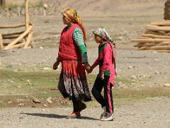 17 Mother Holding Daughters Hand Walking Through Yilik Village On My Trek To K2 China